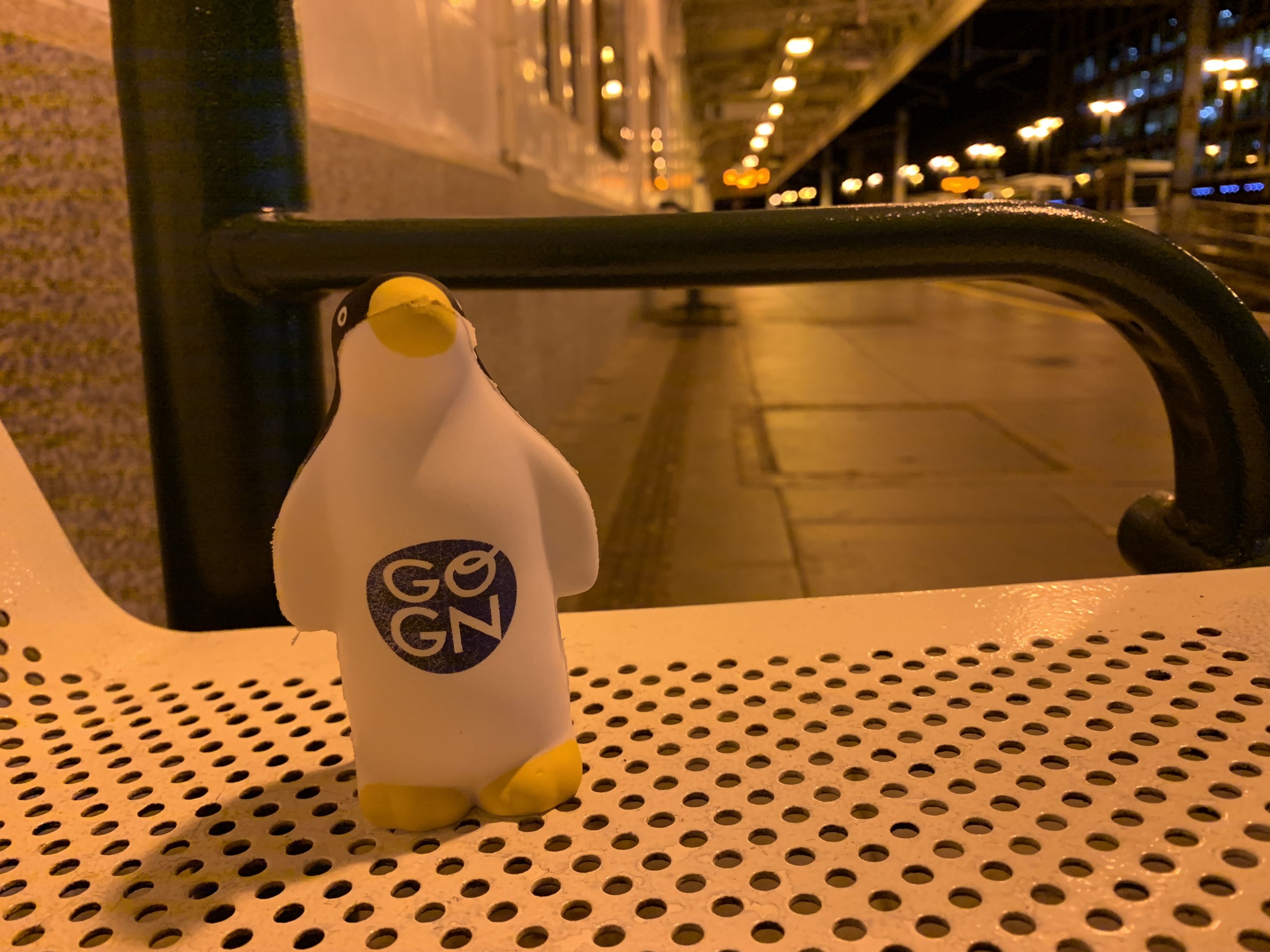 GO-GN Toy penguin on a train platform